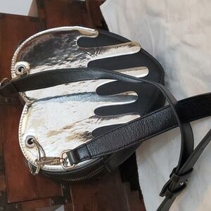 Heart shaped purse black with "dripping metal"